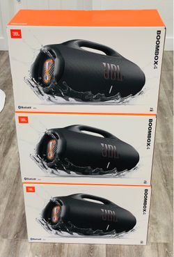 New JBL Boombox 4 speakers. Each speaker is IP68 waterproof and dustproof. Has up to 28 hours of playtime plus 6 hours with playtime boost. Features a