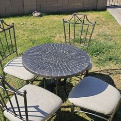 **Beatiful stone top table and 4 metal chairs set**