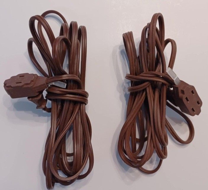 Two indoor 15 foot extension cords 2 prong with 3 outlets