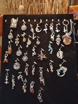 Sterling silver pendants and earrings and other stones
