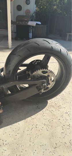 Motorcycle rear wheel and swing arm