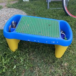 Lego Style Board With Some Blocks And Extra Throw In Toys