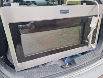 MAYTAG STAINLESS STEEL OVER THE RANGE MICROWAVE. 