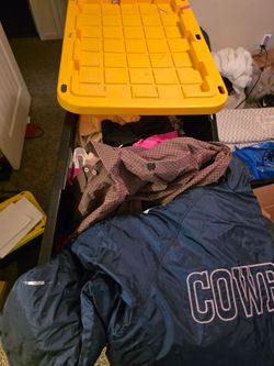 3 boxes of new and used clothes