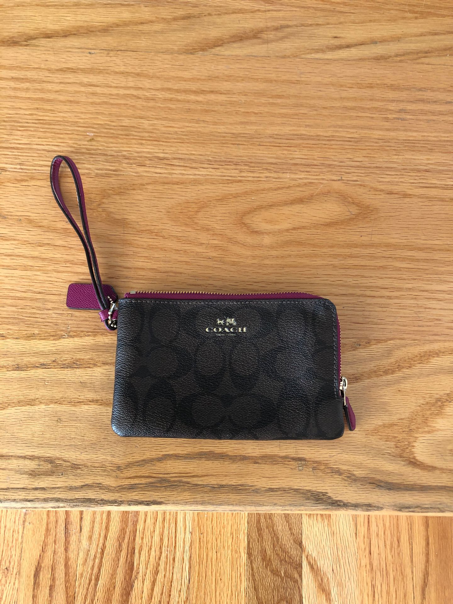 Coach wristlet ... never used! Paid $80. Asking $30