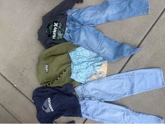Box of boys clothes size S-M