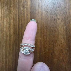 Rose gold two-piece engagement ring with matching band