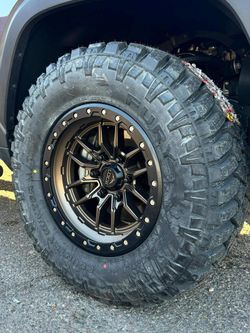 17x9 Rims And Tires 33/1250/17 MT