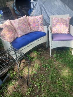 Outdoor love seat and chair with cushions