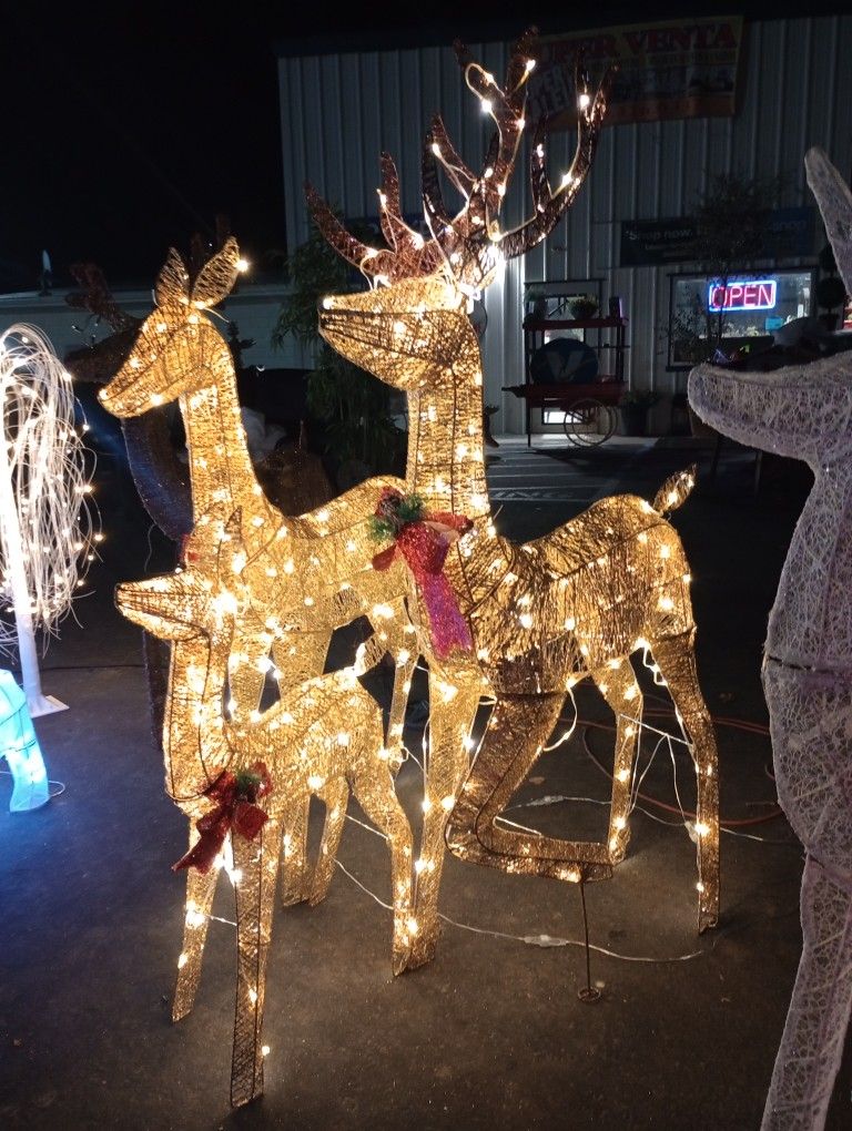 Reindeer Family, Tree With Decorations And Lawn Ornaments