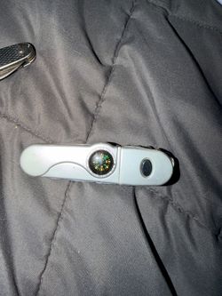 Compact Multi-Tool with Compass and Light