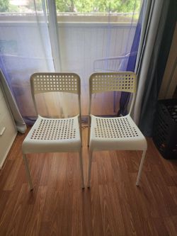 Two Sturdy White Chairs