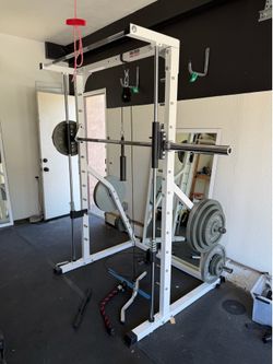 Smith Machine + 18 Barbell plates + pulley system w/ attachments