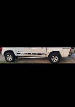 16" OEM Toyota Tacoma TRD Off-Road Wheels & Dextero All-Terrain Tires - Set of 4