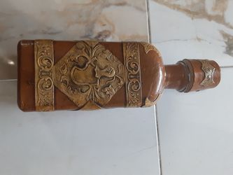 Antique bottle hand made leather