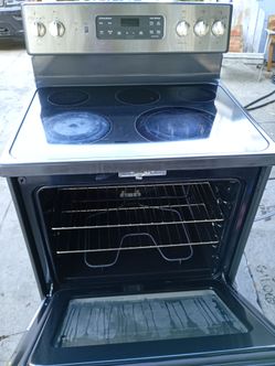 GE stainless steel electric glass top stove