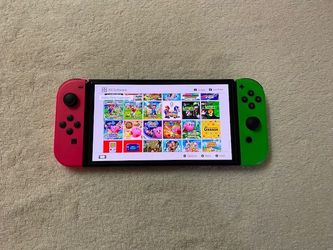 NINTENDO SWITCH OLED with 120 SWITCH GAMES + 7000 CLASSIC GAMES