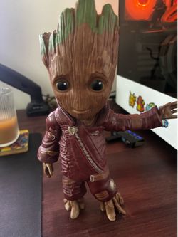 Baby groot toy in ravanger suit