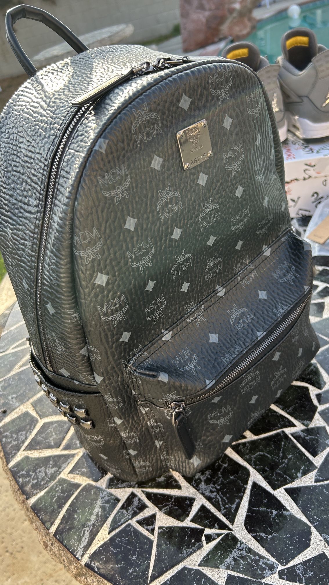 “Black Mcm Backpack”