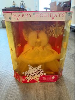 Box of Barbies and Precious Moments