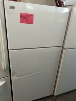 Refrigerator white garage special has dent works great . Warranty . Delivery available . 2203 Fowler st . Ft. Myers 33901