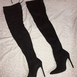 Black thigh high boots