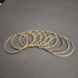 Set Of 9 Goldtone Metal Bangle Bracelets 2 5/8" Opening 
