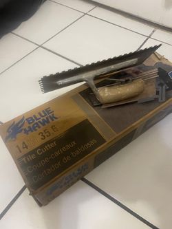 14 “ tile cutter w trowel $20
