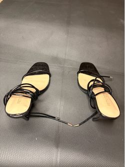 Black strap up heels