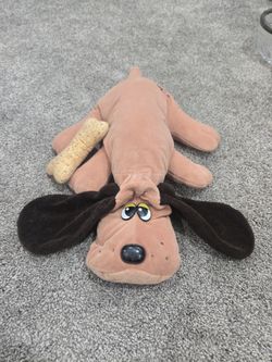 Vintage pound puppy with bone