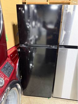 New open box LG black top and bottom refrigerator 10 cubic