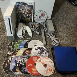 Nintendo Wii w/ Base & 18 Games $180 Firm