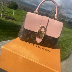 Louis Vuitton Locky Handbag