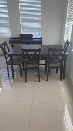 4 chairs and a table