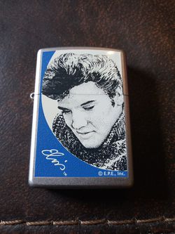 Elvis Zippo Blue in Sweater. No cover its new had gas