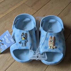 Toddler Bingo & Bluey Comfort Slide Sandals, 10T. Heel Strap, Textured Outer Sole, Open Toes. 

Style meets playfulness with the Toddler Bluey Comfort
