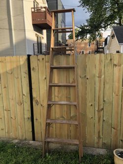 8 ’ wood ladder.