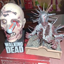 $200.00 FOR BOTH WALKING DEAD STATUES  LIKE NEW!!!
