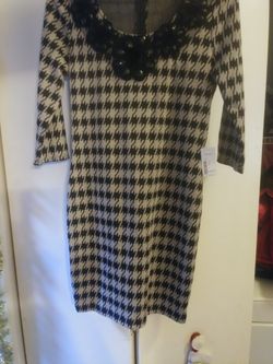 Very nice dress size Medium. NEW
