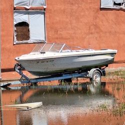 Small Boat And Aluminum Trailer 