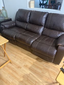 Brown Leather Reclining Sofa and loveseat