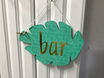 “Bar” Sign Gold Letters on Bright Tropical Green Background Measures 12” Wide x 8” Tall