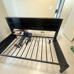 Twin size bed with book shelf and rollout with usb..