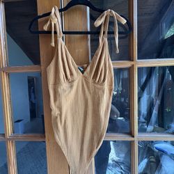 P.S. Kate beige tank w/ floral criss-cross back Size medium, runs a little small