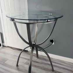 Tall Modern Glass Accent Table – 41” High – $25 📍 Pickup: S. Durango & 215, near IKEA  Modern tall tempered glass accent table with a sturdy brushed 