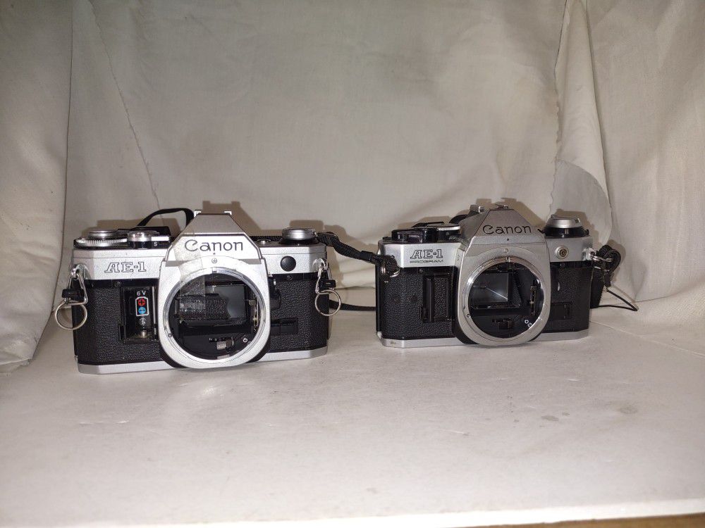 2 Canon Film Cameras AE-1 Program & AE-1 35mm SLR  (contact info removed) &(contact info removed) no lens Parts Only! 