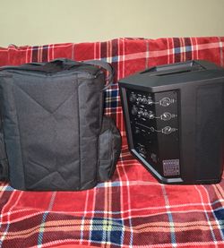 Bose1 battery and AC powered speakers with carrying bags