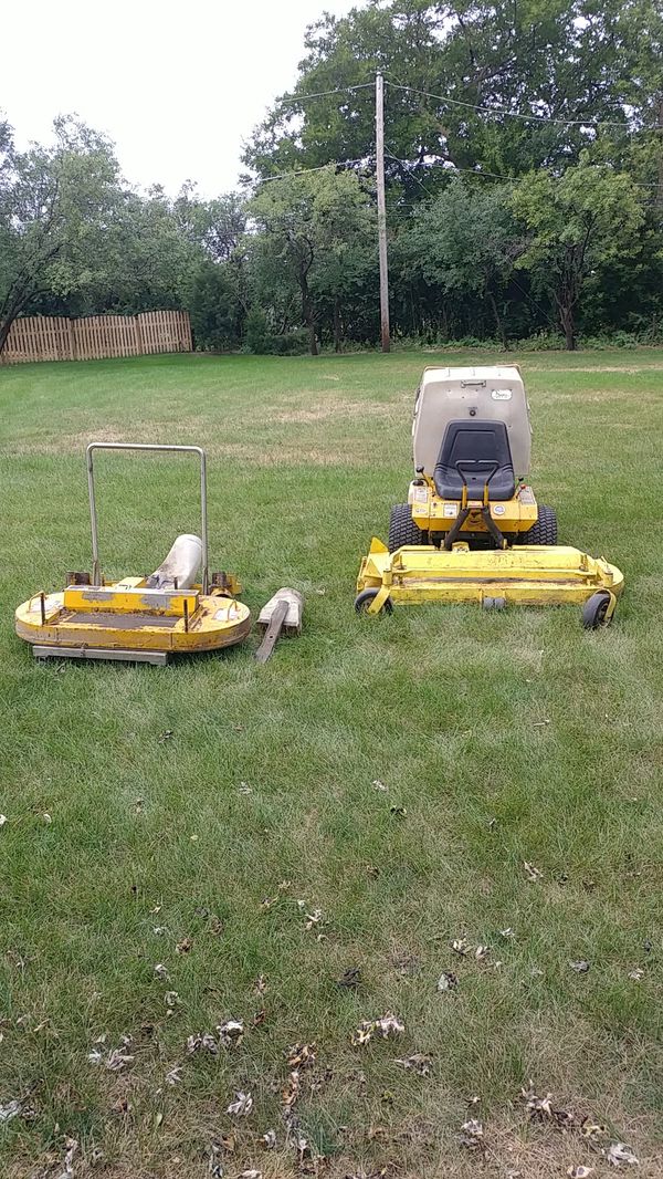 Walker. Zero turn lawn mower,rear bagger,two decks one 42" and a 52