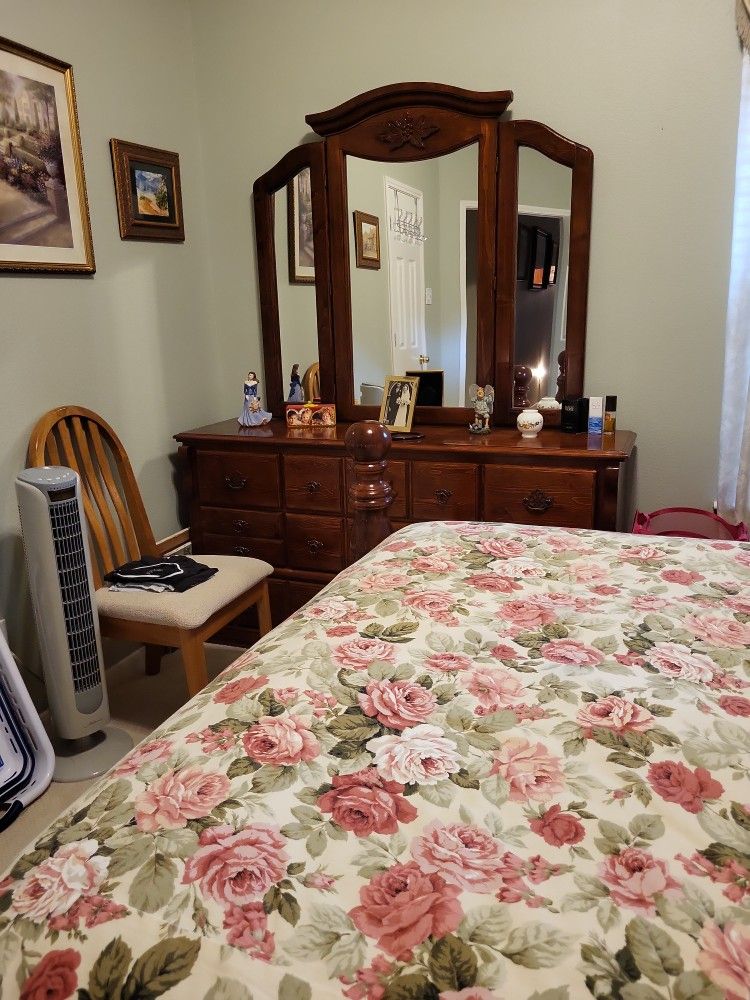 Queen bedroom suite. Included: Dresser, Queen Bed, 2 bedside tables.