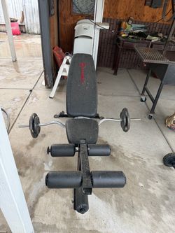 Bench with weights and bar